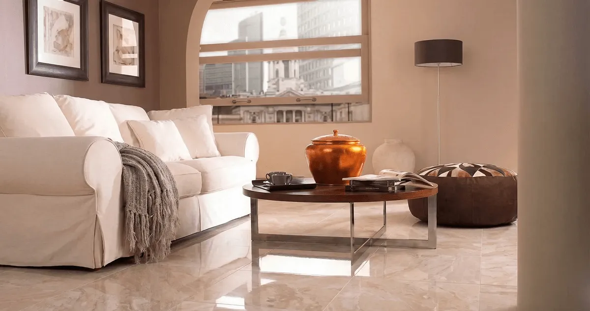 Modern living room with professionally installed marble flooring, a beige sofa, coffee table in Pittsburgh, PA